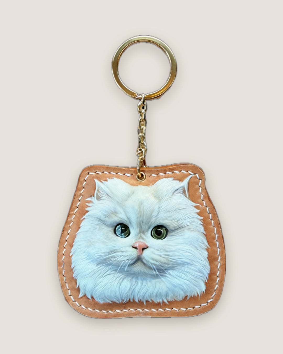 White Persian cat keychain cut to the shape of its head
