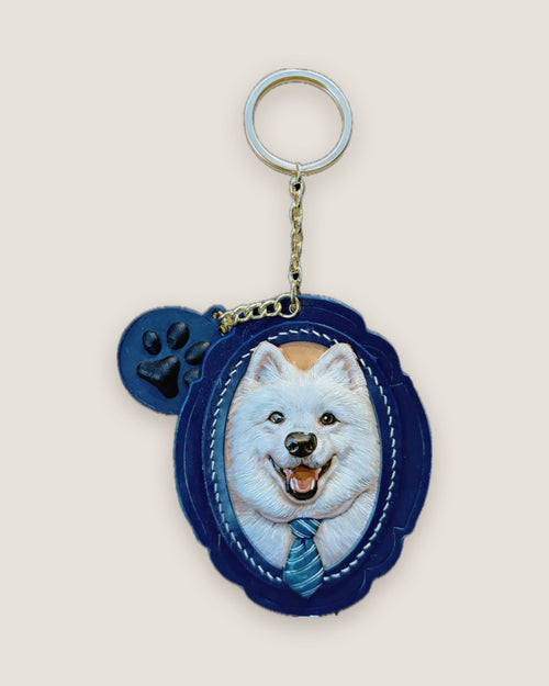Samoyed portrait in a navy scalloped leather frame with a paw charm